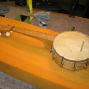 Restored rare old small 4 string banjo